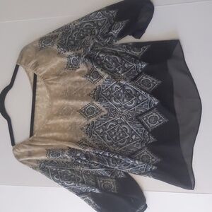 See though women's blouse size large,no tag.